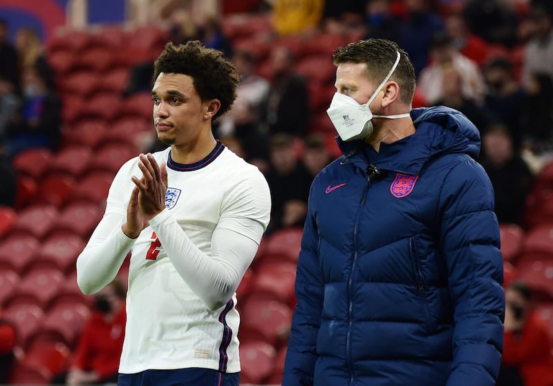 England's Trent Alexander-Arnold applauds fans as he walks off after sustaining an injury. Reuters