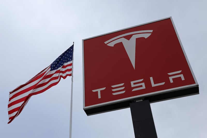 FILE PHOTO: A Tesla charging station is seen in Salt Lake City, Utah, U.S., September 28, 2017. REUTERS/Lucy Nicholson/File Photo