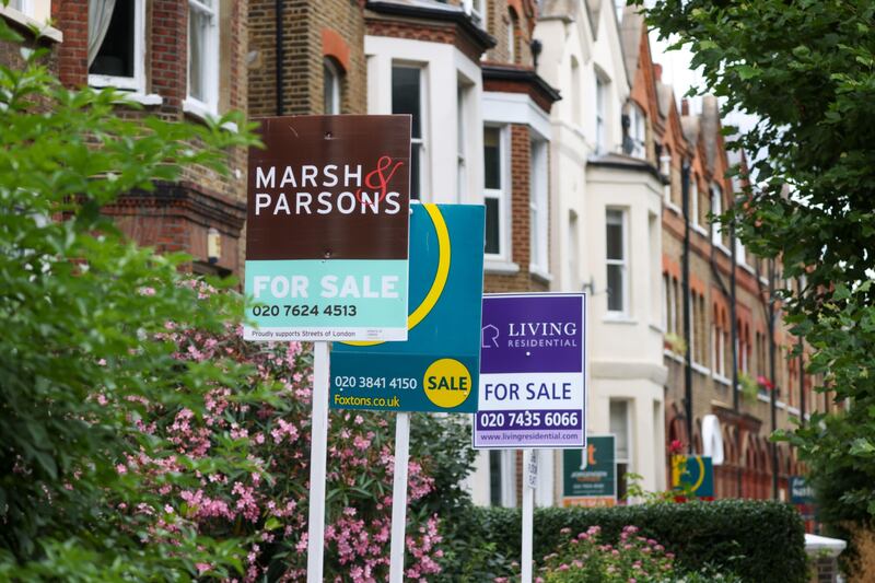 Estate agent 'For Sale' signs outside residential properties in the Queen's Park district of London, UK. Bloomberg
