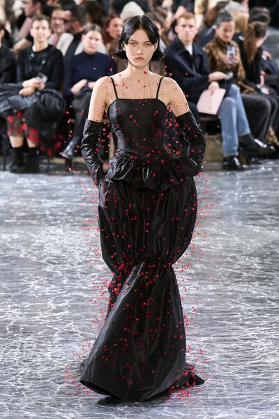Simone Rocha's all-black look, with flowers and long stems for Jean Paul Gaultier's spring 2024 haute couture, would work well. Photo: Jean Paul Gaultier