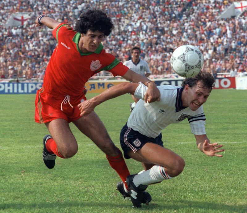 England captain and midfiedler Bryan Robson is fouled by Moroccan Mostafa El Biaz during the World Cup first round match on June 6, 1986 in Monterrey. AFP