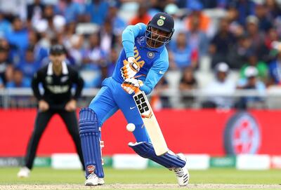 MANCHESTER, ENGLAND - JULY 10:  Ravindra Jadeja of India hits a six during resumption of the Semi-Final match of the ICC Cricket World Cup 2019 between India and New Zealand after weather affected play at Old Trafford on July 10, 2019 in Manchester, England. (Photo by Michael Steele/Getty Images)