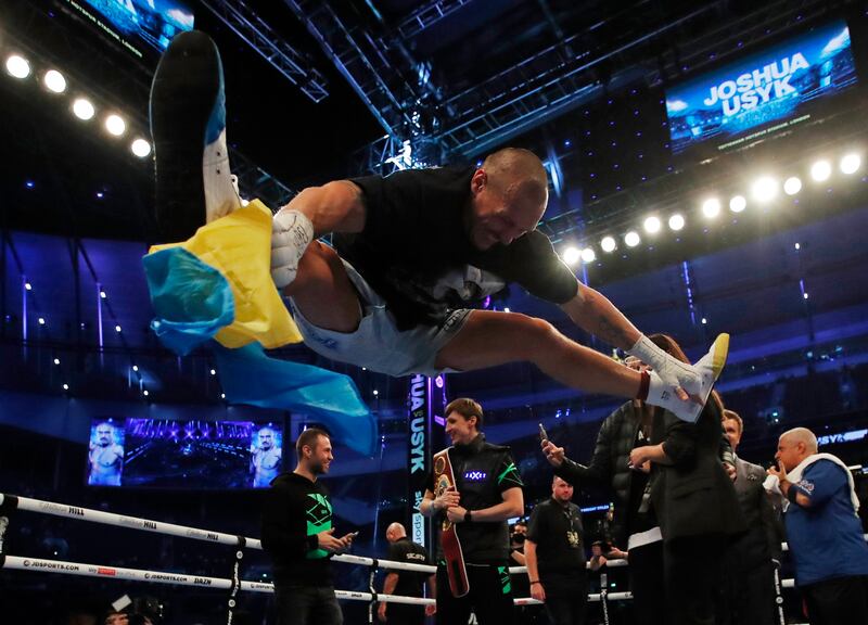 Oleksandr Usyk celebrates after beating Anthony Joshua in their heavyweight world title fight at the Tottenham Hotspur Stadium on Saturday, September 25. Reuters