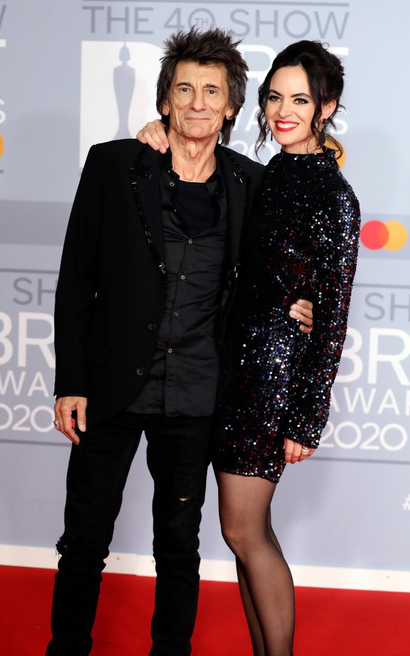 Ronnie Wood and Sally Humphreys arrive at the Brit Awards 2020 at The O2 Arena on Tuesday, February 18, 2020 in London, England. AP