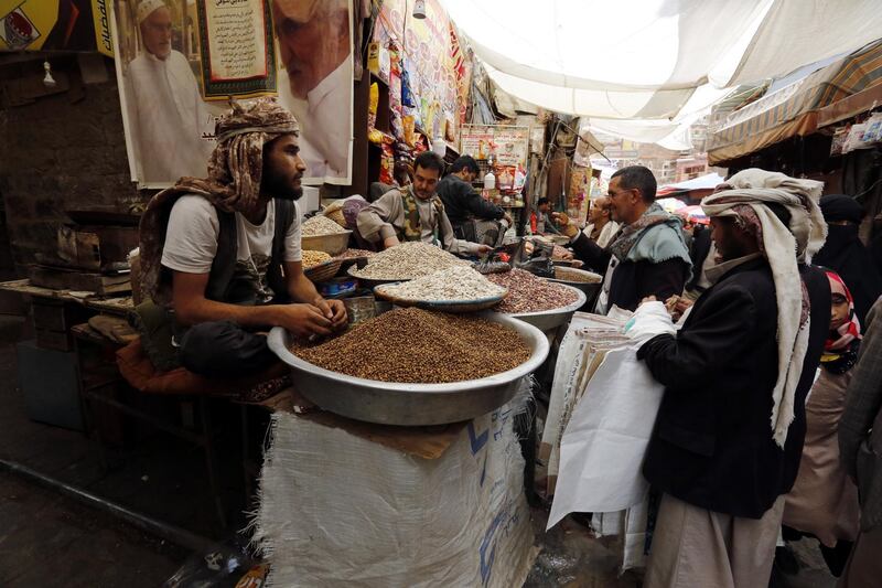 Yemenis shop for the Eid Al Fitr festival, marking the end of the Muslim fasting month of Ramadan, at a market in the old quarter of Sana'a, Yemen. EPA