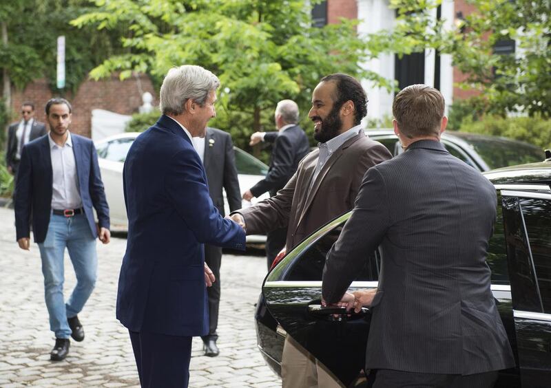 US Secretary of State John Kerry greets Saudi deputy crown Prince Mohammed bin Salman outside Kerry's residence prior to their meeting on June 13, 2016. Molly Riley / AFP Photo