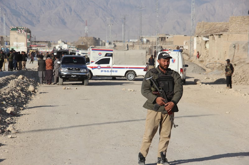 A Pakistani security official stands guard after a bomb blast in Quetta, Pakistan. EPA