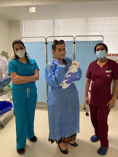 A mother holds her premature baby who was born weighing 870 grams. Courtesy: Medcare Hospital Sharjah 