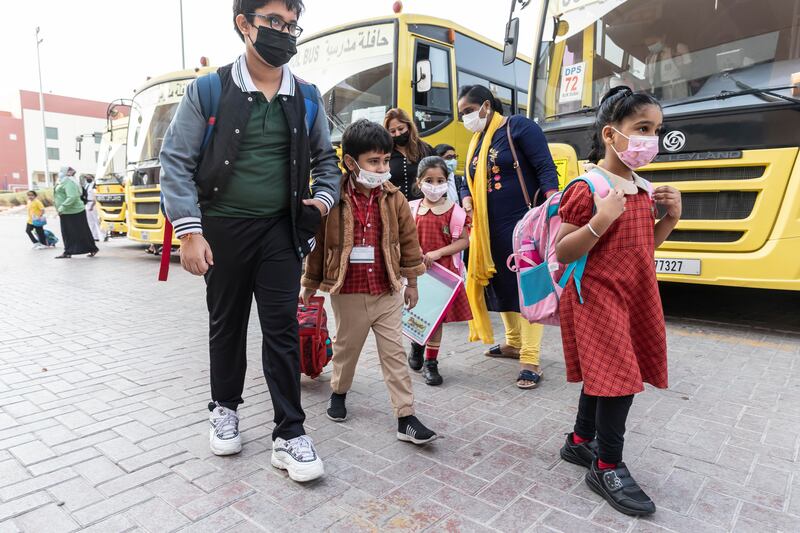 Pupils arrive for the first day of the new term at the Delhi Private School.