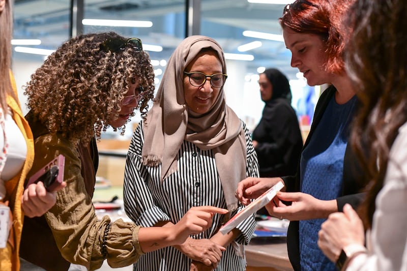 Makki, centre, with students and staff from Sorbonne University Abu Dhabi.