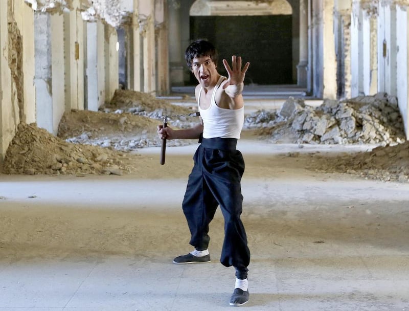 Abbas Alizada, who calls himself the Afghan Bruce Lee, poses in Kabul. Mohammad Ismail / Reuters