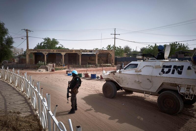 A United Nations vehicle patrols at the Independence square in Tombouctou on March 31, 2021. A symbolic euro was handed over to the government of Mali and UNESCO for damage inflicted by Islamists who wrecked Timbuktu's World Heritage-listed mausoleums in 2012. Fatou Bensouda, the ICC's chief prosecutor, said the case represented the international community's commitment to "defend the foundation of our common identity." / AFP / MICHELE CATTANI
