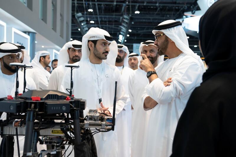 ABU DHABI, UNITED ARAB EMIRATES - February 21, 2019: HH Sheikh Mohamed bin Zayed Al Nahyan, Crown Prince of Abu Dhabi and Deputy Supreme Commander of the UAE Armed Forces (R), visits Earth stand, during the 2019 International Defence Exhibition and Conference (IDEX), at Abu Dhabi National Exhibition Centre (ADNEC). 

( Ryan Carter for the Ministry of Presidential Affairs )
---