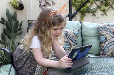 DUBAI, UNITED ARAB EMIRATES , March 22 – 2020 :- Eden Stewart (5 years old) KG student of Dubai American Academy during the online class at her home in the Springs in Dubai. Today is the first day of distance learning as all the schools are closed as a preventive measure against coronavirus. (Pawan Singh / The National) For News/Online/Instagram. Story by Sarwat Nasir