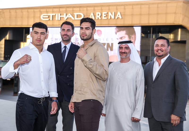 Left to right:  Dmitry Bivol, Eddie Hearn, Zurdo  Ramirez, Saleh Mohammed Al Geziry and Eric Gomez in front of the Etihad Arena in Abu Dhabi. 
