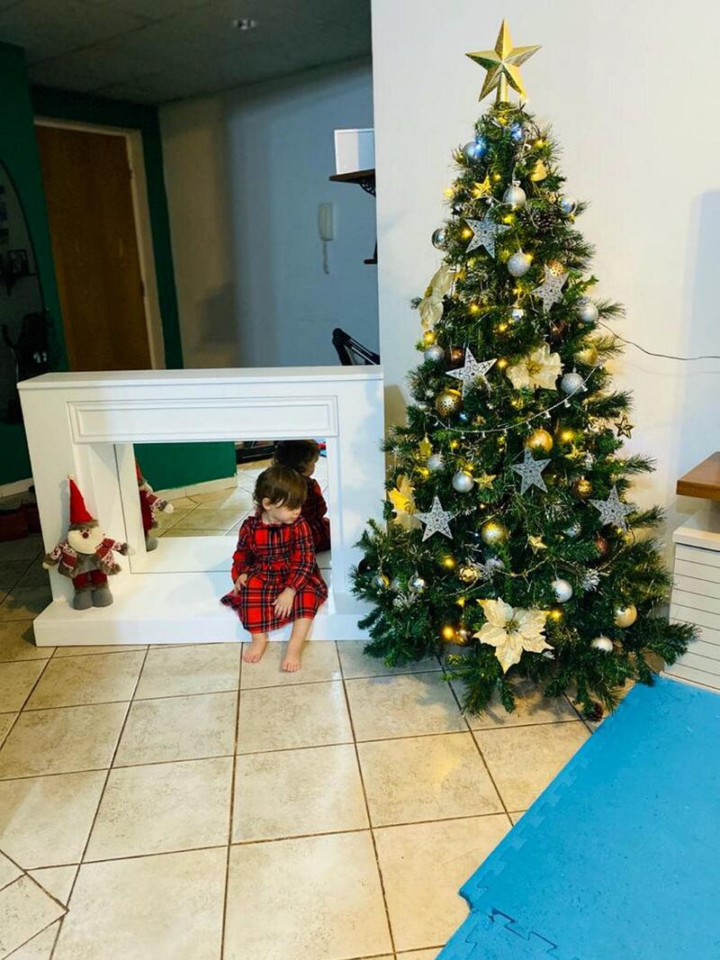 A handmade wooden fireplace from Natasha Smoljo: 'It's not the fanciest decoration but our little elf loved it very much.'