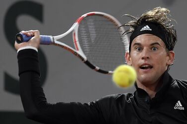 Dominic Thiem in action against Marin Cilic during their men's first round match at the French Open. EPA