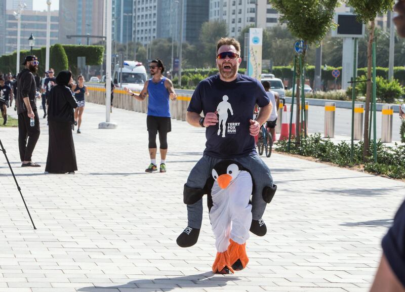 ABU DHABI, UNITED ARAB EMIRATES - A participant with funny attire at the Terry Fox Run, Corniche Beach.  Leslie Pableo for The National