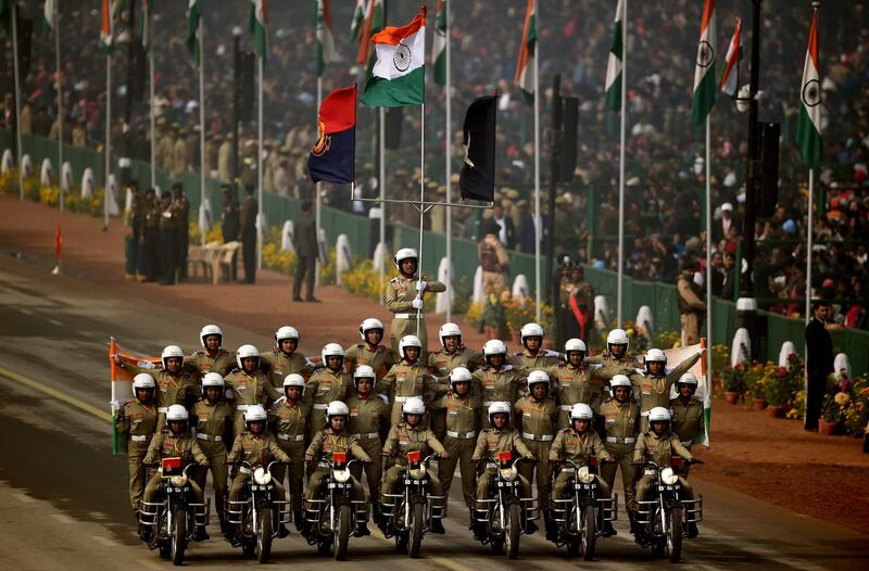 BSF stunt riders take part in the parade in New Delhi. Money Sharma / AFP