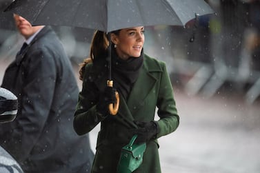Catherine, Duchess of Cambridge carries a Manu Atelier bag as she visits Blackpool Tower in March. EPA