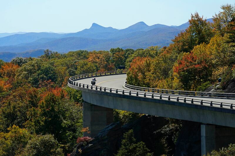 A motorcyclist navigates the Linn Cove Viaduct at Grandfather Mountain along the Blue Ridge Parkway in North Carolina. AP
