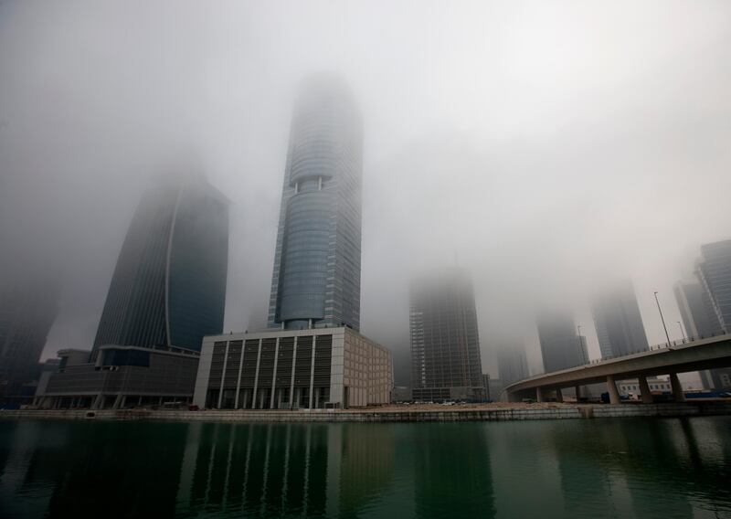  Dubai, United Arab Emirates, Jan 23 2013, Dubai stables Weather- A thick fog blanket slowly burns off  Dubai downtown area near Dubai Stables and Meydan rd 230113 . Mike Young / The National 