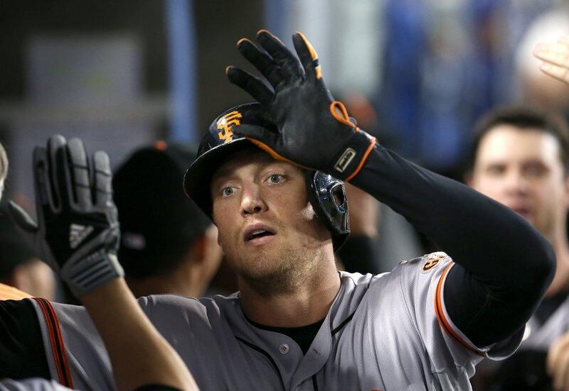 Hunter Pence hit a grand slam against the Dodgers on Saturday night. Stephen Dunn / Getty Images / AFP