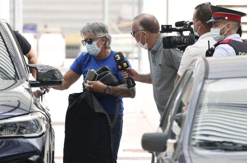 Lionel Messi's father and agent Jorge Messi arrive to El Prat International Airport in Barcelona.