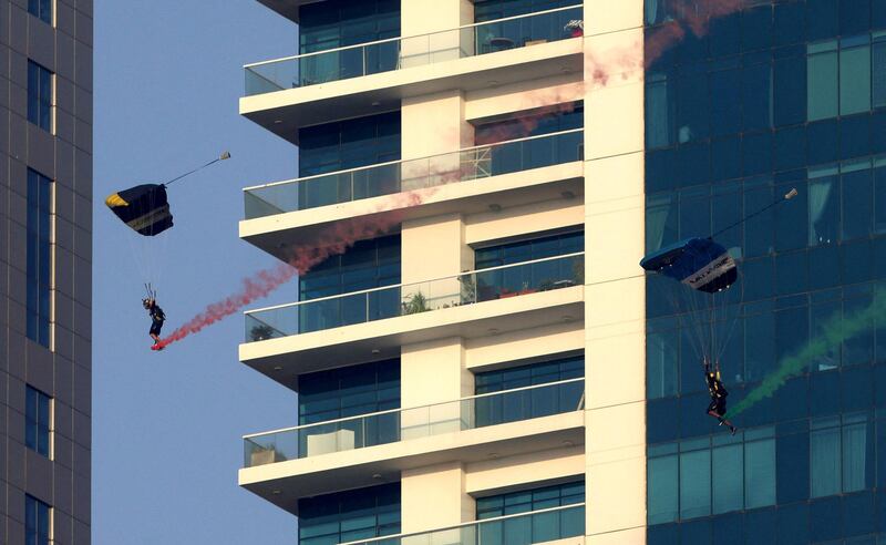 A parachutist comes in to land at Dubai Marina. AFP