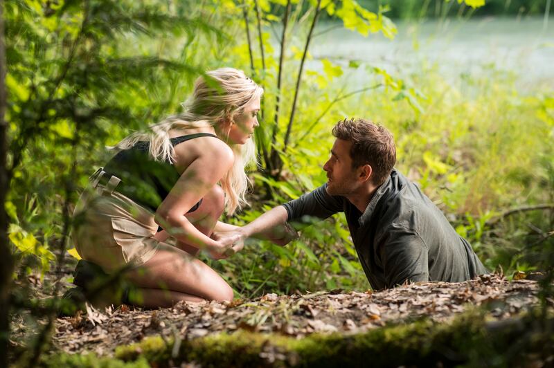 Ashley Benson as Cara, left, and Oliver Jackson-Cohen as Will Taylor in Wilderness. AP