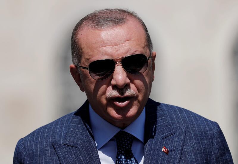 FILE PHOTO: Turkish President Tayyip Erdogan talks to media after attending Friday prayers at Hagia Sophia Grand Mosque in Istanbul, Turkey August 7, 2020. REUTERS/Murad Sezer/File Photo