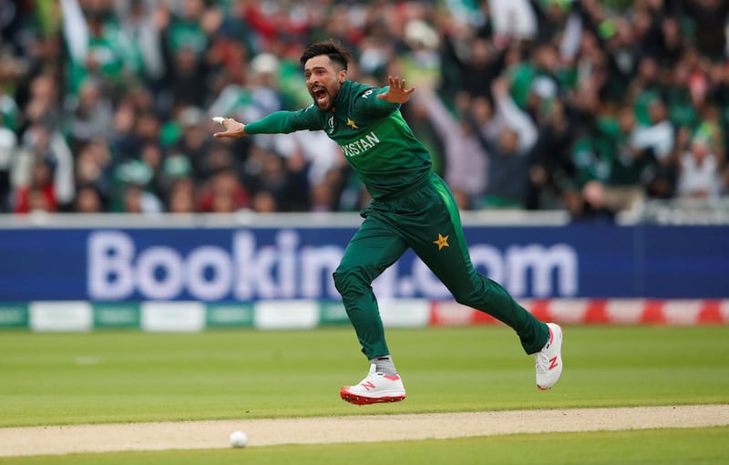 FILE PHOTO: Cricket - ICC Cricket World Cup - New Zealand v Pakistan - Edgbaston, Birmingham, Britian - June 26, 2019   Pakistan's Mohammad Amir celebrates taking the wicket of New Zealand's Martin Guptill   Action Images via Reuters/Andrew Boyers/File Photo