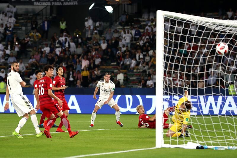 ABU DHABI, UNITED ARAB EMIRATES - DECEMBER 19: Gareth Bale of Real Madrid scores the third goal and his hat-trick during the FIFA Club World Cup semi-final match between Kashima Antlers and Real Madrid at Zayed Sports City Stadium on December 19, 2018 in Abu Dhabi, United Arab Emirates. (Photo by Francois Nel/Getty Images)