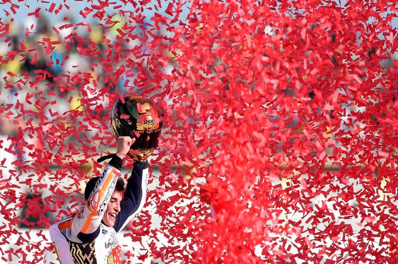 Repsol Honda Team's Spanish rider Marc Marquez celebrates winning the Valencia MotoGP.  Jose Jordan / AFP Photo / November 12, 2017