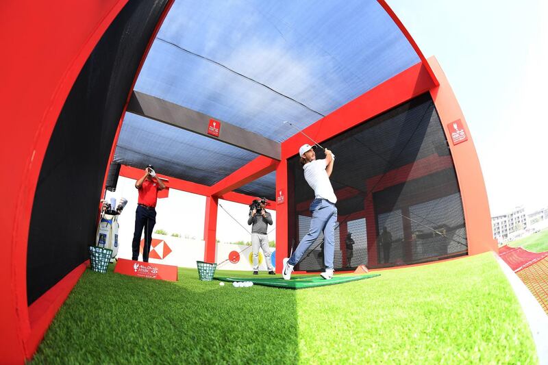 Tommy Fleetwood takes part in Top Golf Crush ahead of the Abu Dhabi HSBC Championship. Ross Kinnaird / Getty Images