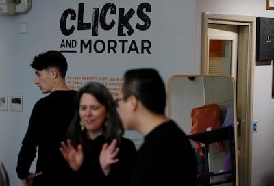 People are seen inside the Amazon-backed pop up store 'Clicks and Mortar' in Manchester, Britain, June 3, 2019. REUTERS/Phil Noble