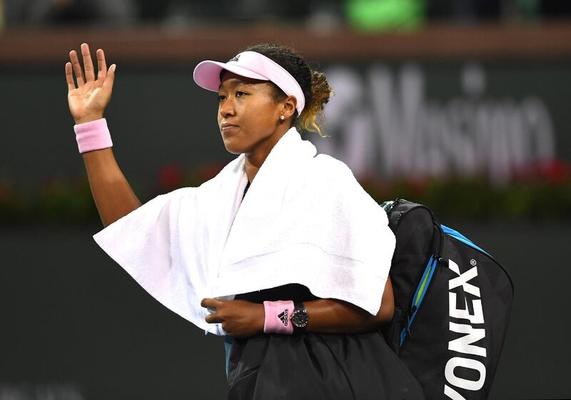 Mar 12, 2019; Indian Wells, CA, USA; Naomi Osaka (JPN) waves to fans while leaving the court after being her fourth round match against Belinda Bencic (not pictured) in the BNP Paribas Open at the Indian Wells Tennis Garden. Mandatory Credit: Jayne Kamin-Oncea-USA TODAY Sports