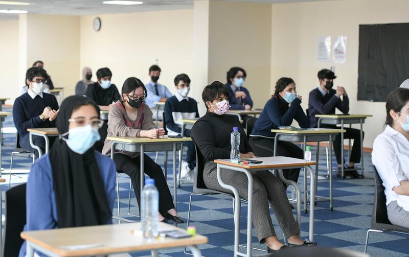 Abu Dhabi, United Arab Emirates - Pupils seated for the Biology, grade 12 exam following social distancing guidelines at Gems Cambridge International School in Baniyas. Khushnum Bhandari for The National