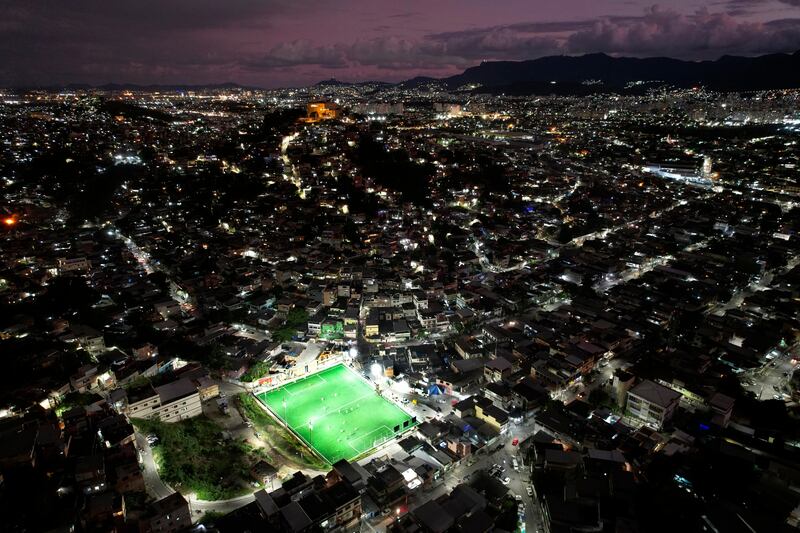 Pitches where boys sharpen their football skills at the Complexo do Alemao favela, Rio de Janeiro, Brazil.  Brazil goes to the World Cup in Qatar as the top-rated team in the latest Fifa rankings. AP Photo