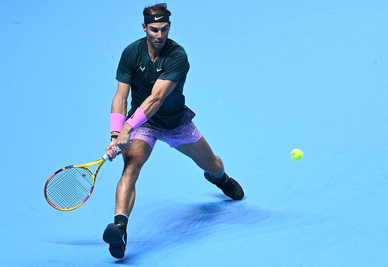 Rafael Nadal of Spain returns to Andrey Rublev of Russia during their group stage match at the ATP Finals in London. EPA