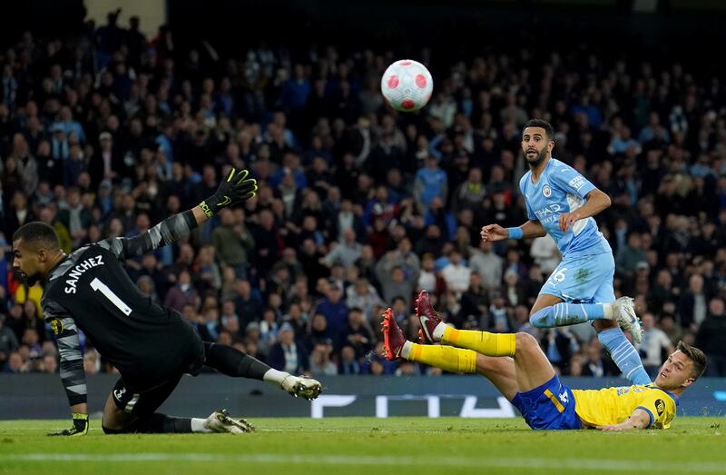 Manchester City's Riyad Mahrez scores the opening goal. PA