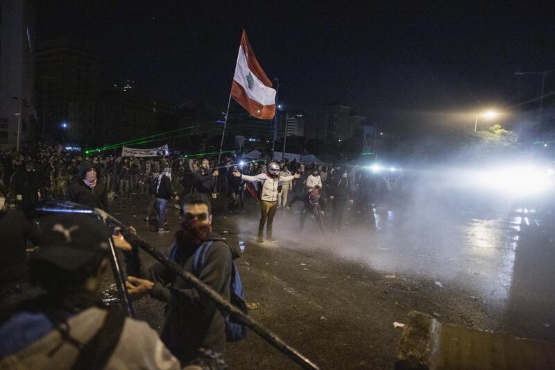 Security forces fire a water cannon at anti-government protester near the Grand Serail on January 25, 2020 in Beirut, Lebanon. Getty Images