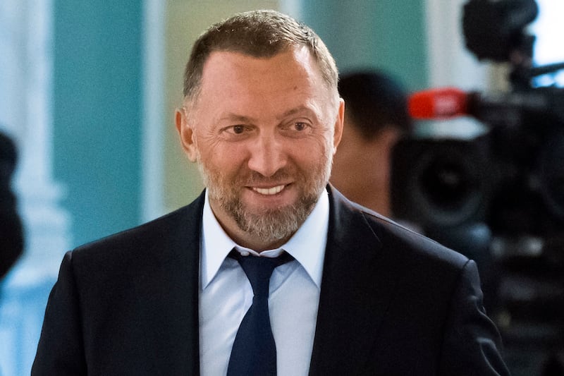 Russian metals magnate Oleg Deripaska attends a meeting with Russian President Vladimir Putin outside St Petersburg, Russia. AP