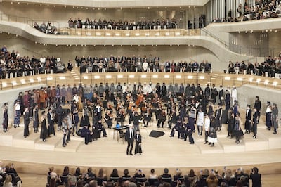 Karl Lagerfeld shares the stage with his models, celebrated cellist Oliver Coates and the Resonanz ensemble. Courtesy Chanel
