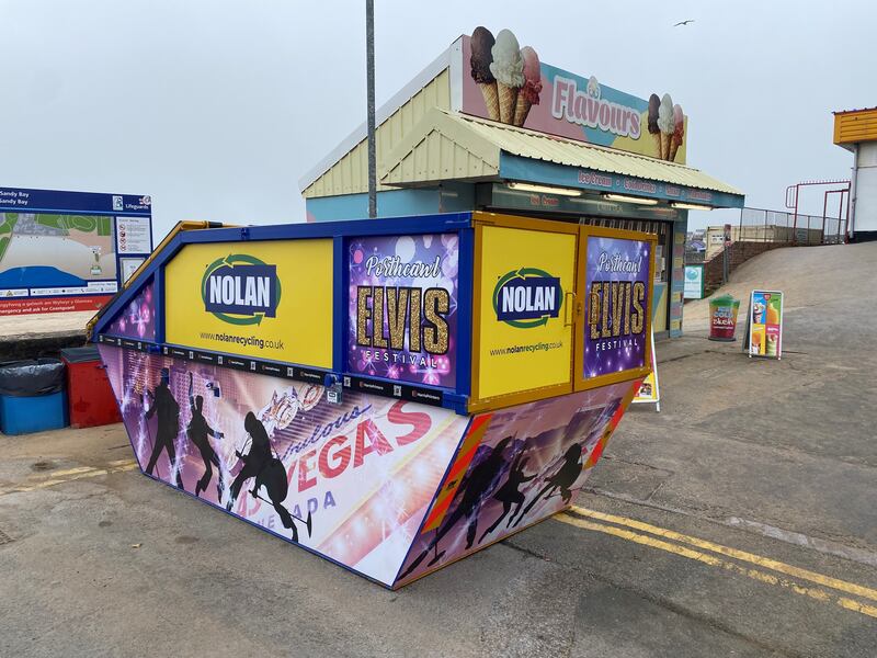 Even the rubbish skips are given an Elvis makeover, advertising details of the festival outside Coney Beach funfair in Porthcawl.