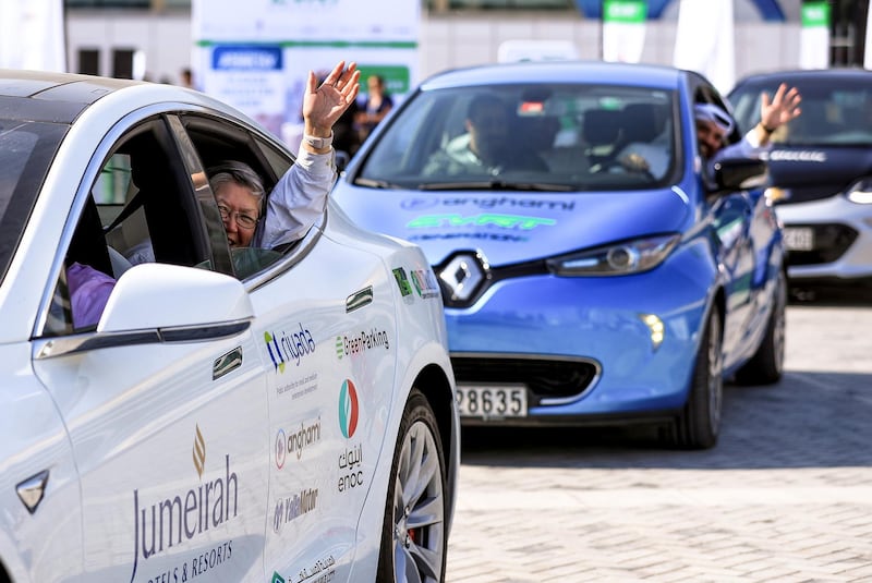 Abu Dhabi, U.A.E., January 17, 2019.  
ADSW Day 4.  Electric Vehicle Road Trip (EVRT) Middle East launch at the World Future Energy Summit, Adnec, Abu Dhabi.--Participants wave at the crowd before going on their electric vehicle adventure.
Victor Besa / The National
Section:  Motoring
Reporter:  Adam Workman
