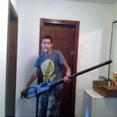 An image of Salman Abedi in Libya holding a weapon. PA