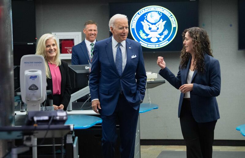 US President Joe Biden speaks with the Director of the National Counterterrorism Centre, Christine Abizaid.  Photo by SAUL LOEB  /  AFP