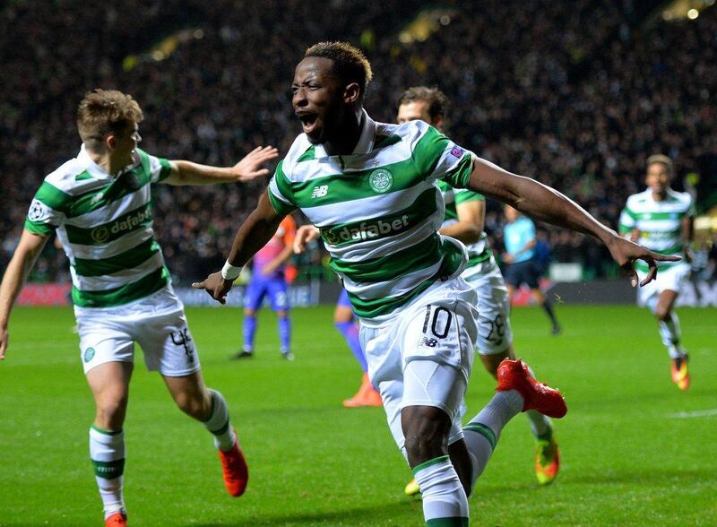 Moussa Dembele of Celtic celebrates after scoring the opening goal against Manchester City in the Champions League. Mark Runnacles / Getty Images