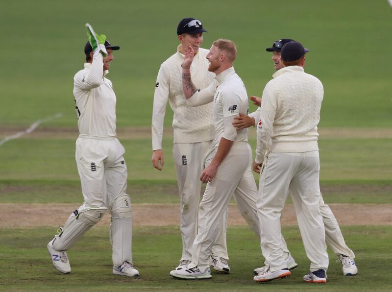 England all-rounder Ben Stokes, centre, celebrates taking the wicket of South Africa's Anrich Nortje. Reuters